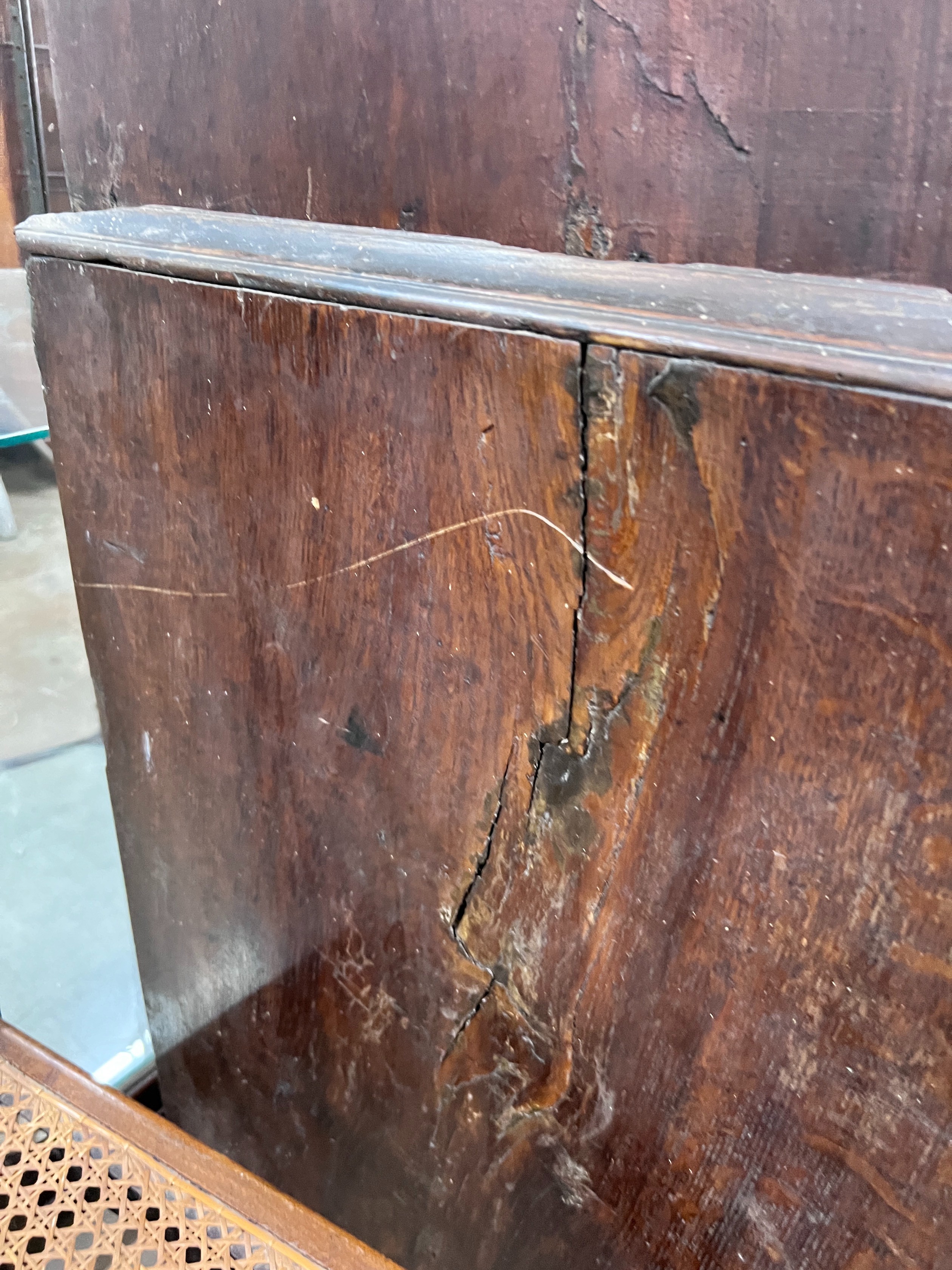 A George III oak press cupboard with two panelled doors over five drawers, width 111cm, depth 53cm, height 186cm *Please note the sale commences at 9am.